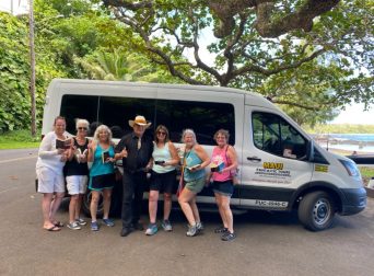 A group of travelers who participated in the Road to Hana tour with Maui Fantastic Tours